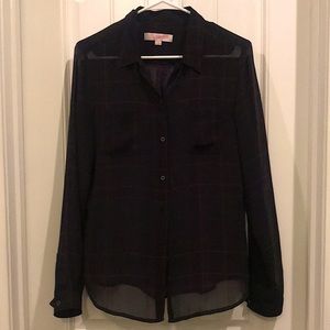 Sheer plaid button up shirt.